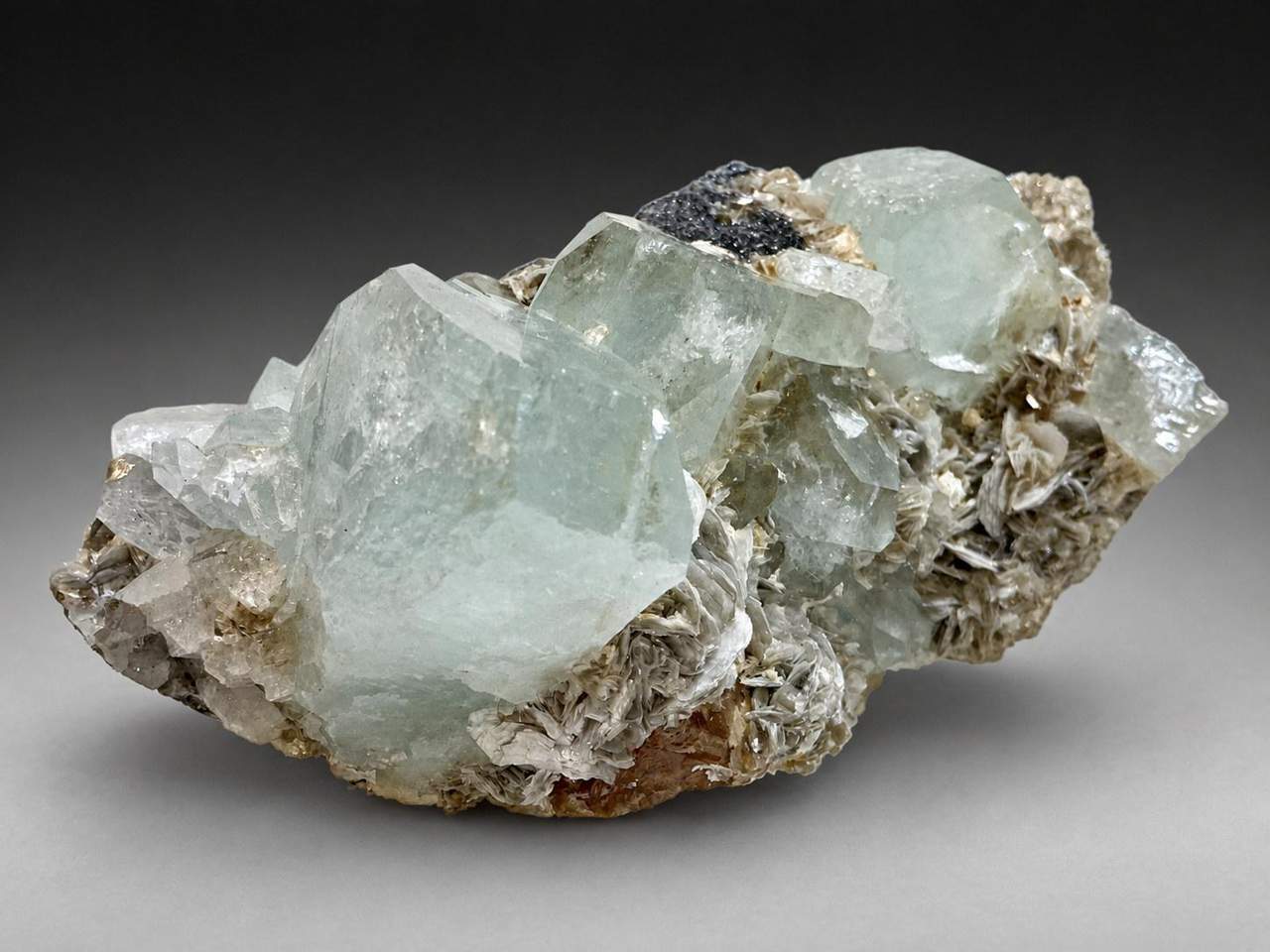 Pale blue Aquamarine on Muscovite