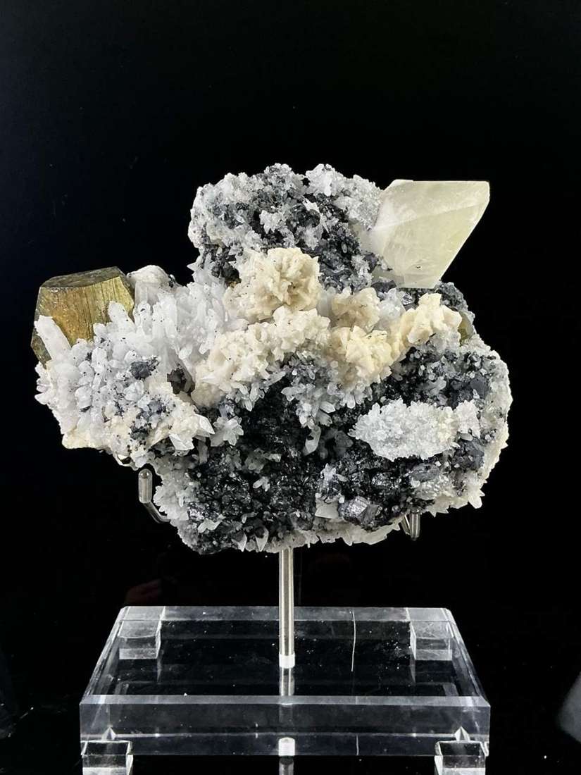 Mineral specimen displayed on a stand