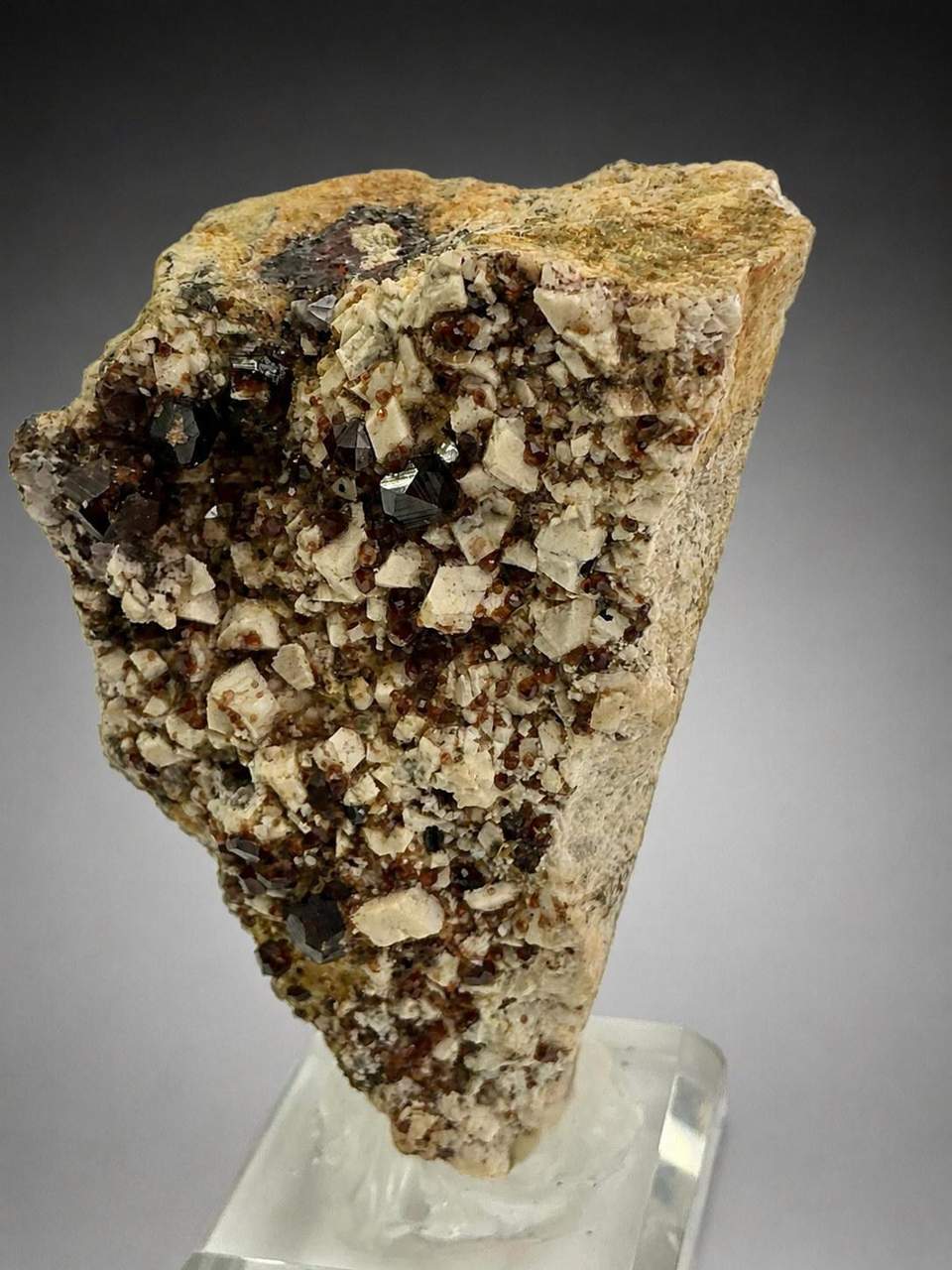 Chinese mineral specimen on an acrylic display stand