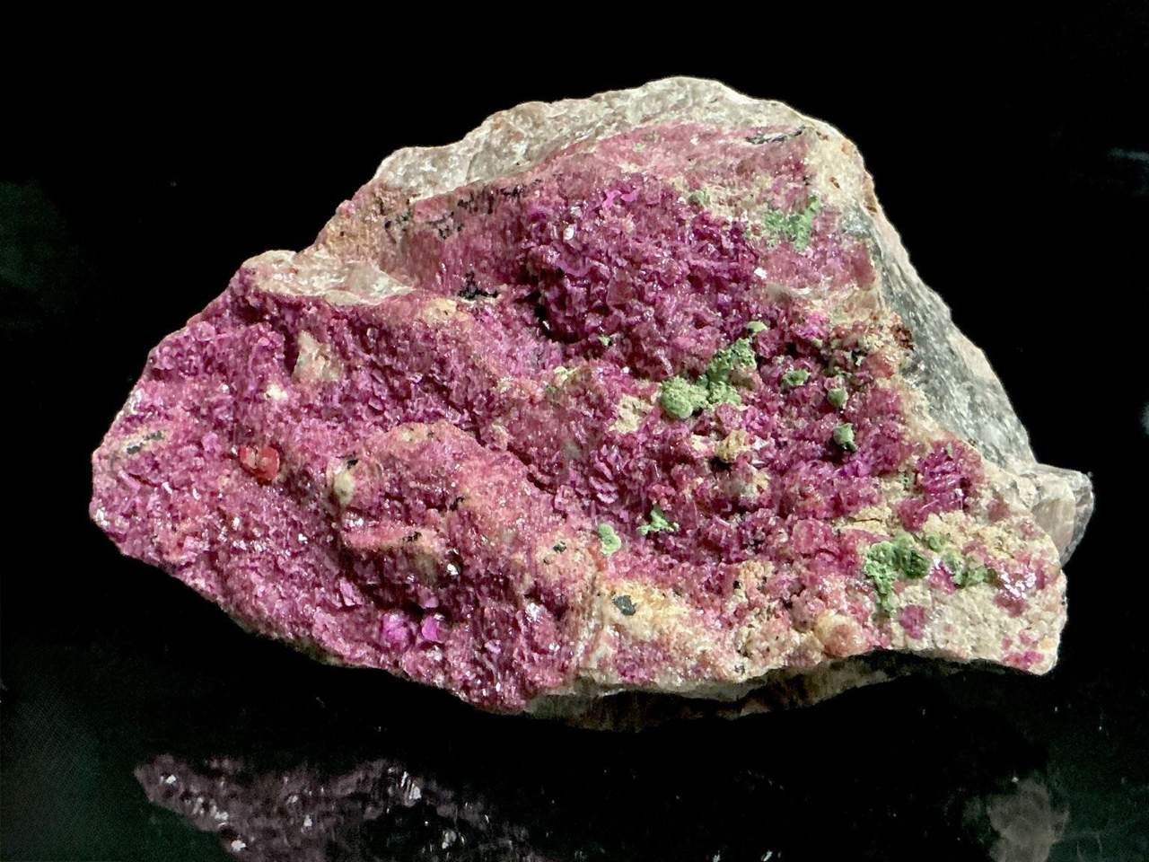 Broad pink Cobaltoan Calcite crystal specimen with small green mineral areas from Kolwezi