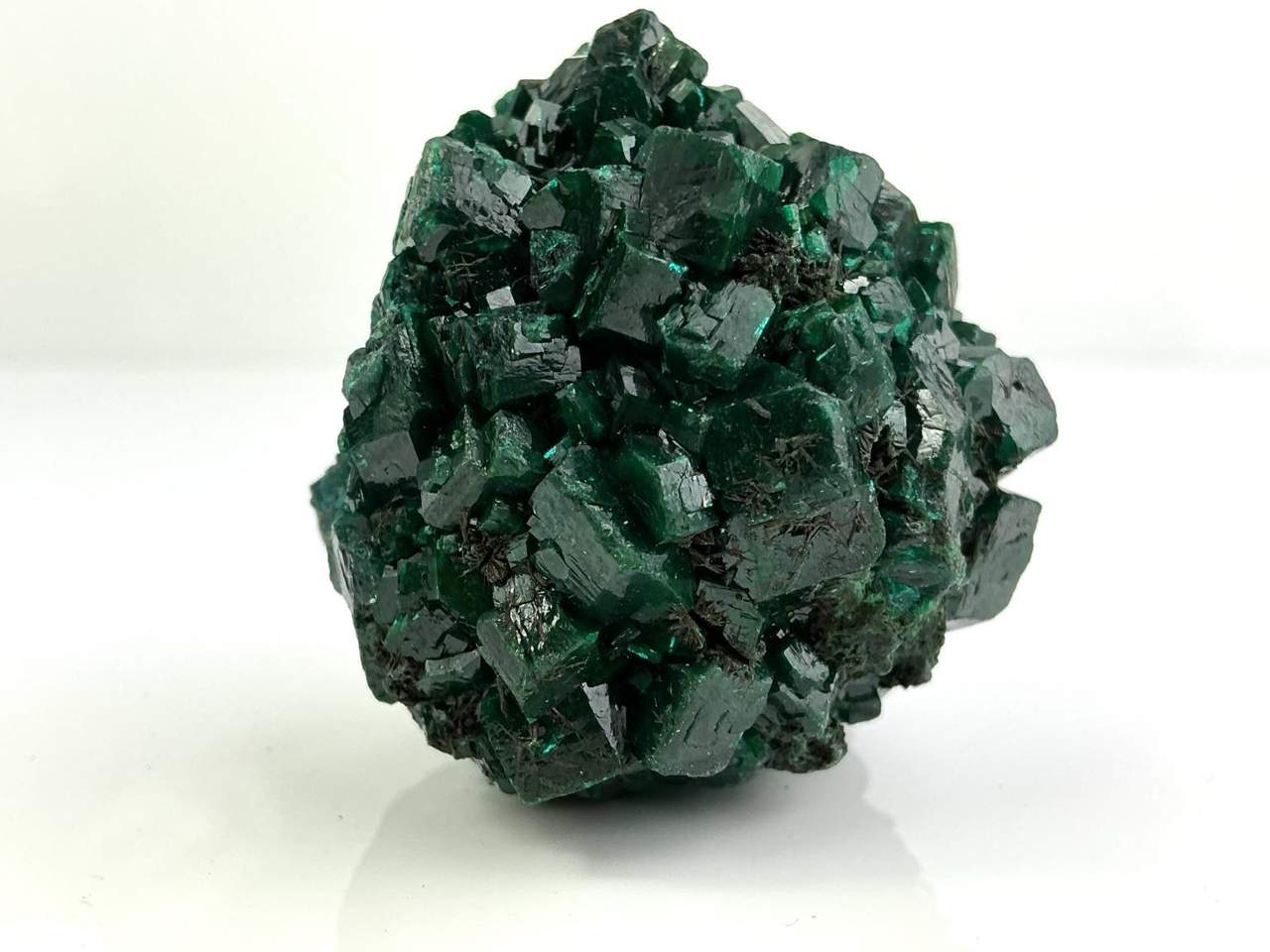 Emerald-green Dioptase crystal cluster with textured Fornacite association from N’tola Mine, Mindouli District, Republic of the Congo