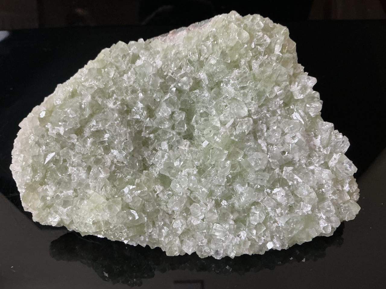 Pale green Apophyllite crystals with Calcite on basalt, Maharashtra, India