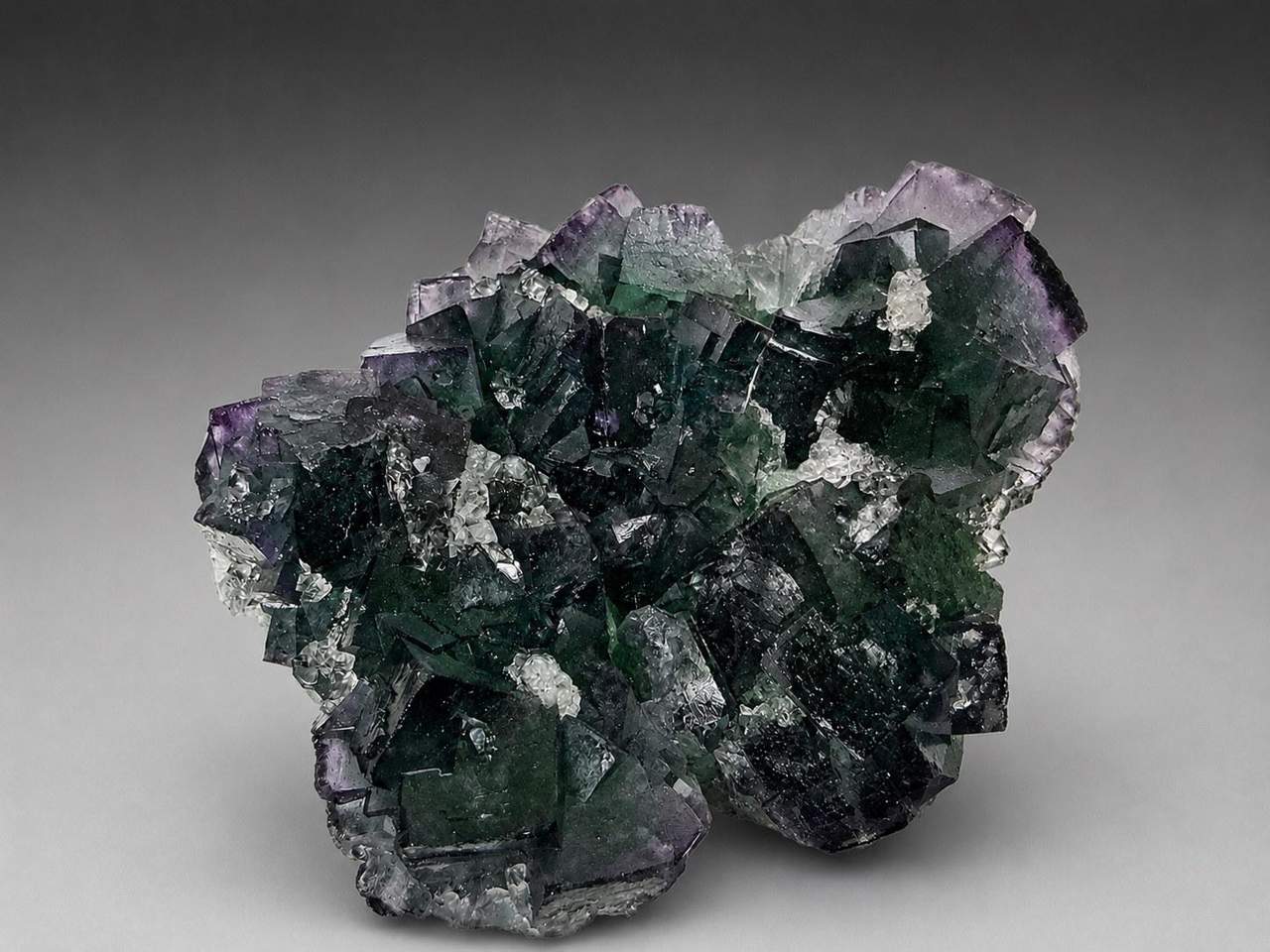 3 of 6: green and purple cubic Fluorite on pale Quartz-rich matrix