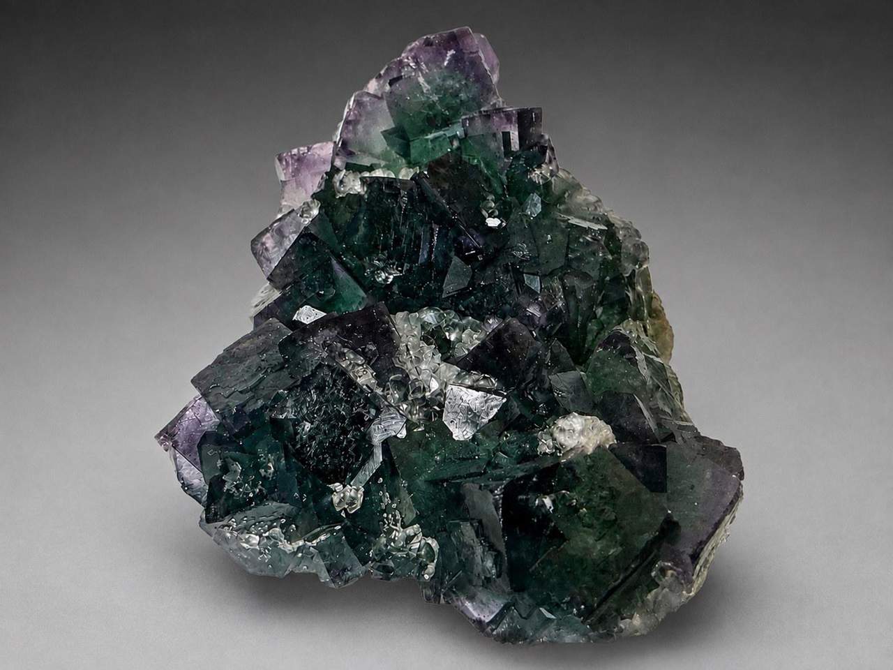 4 of 6: green and purple cubic Fluorite on pale Quartz-rich matrix
