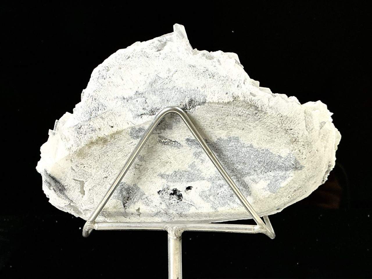 Reverse of the Calcite specimen and its display stand