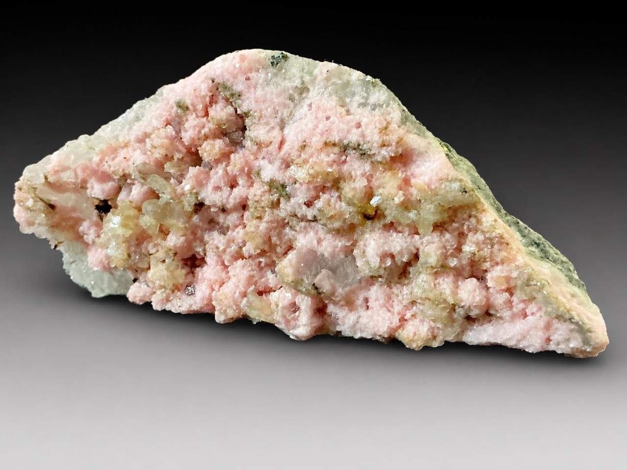 Soft pink Rhodochrosite mineral specimen
