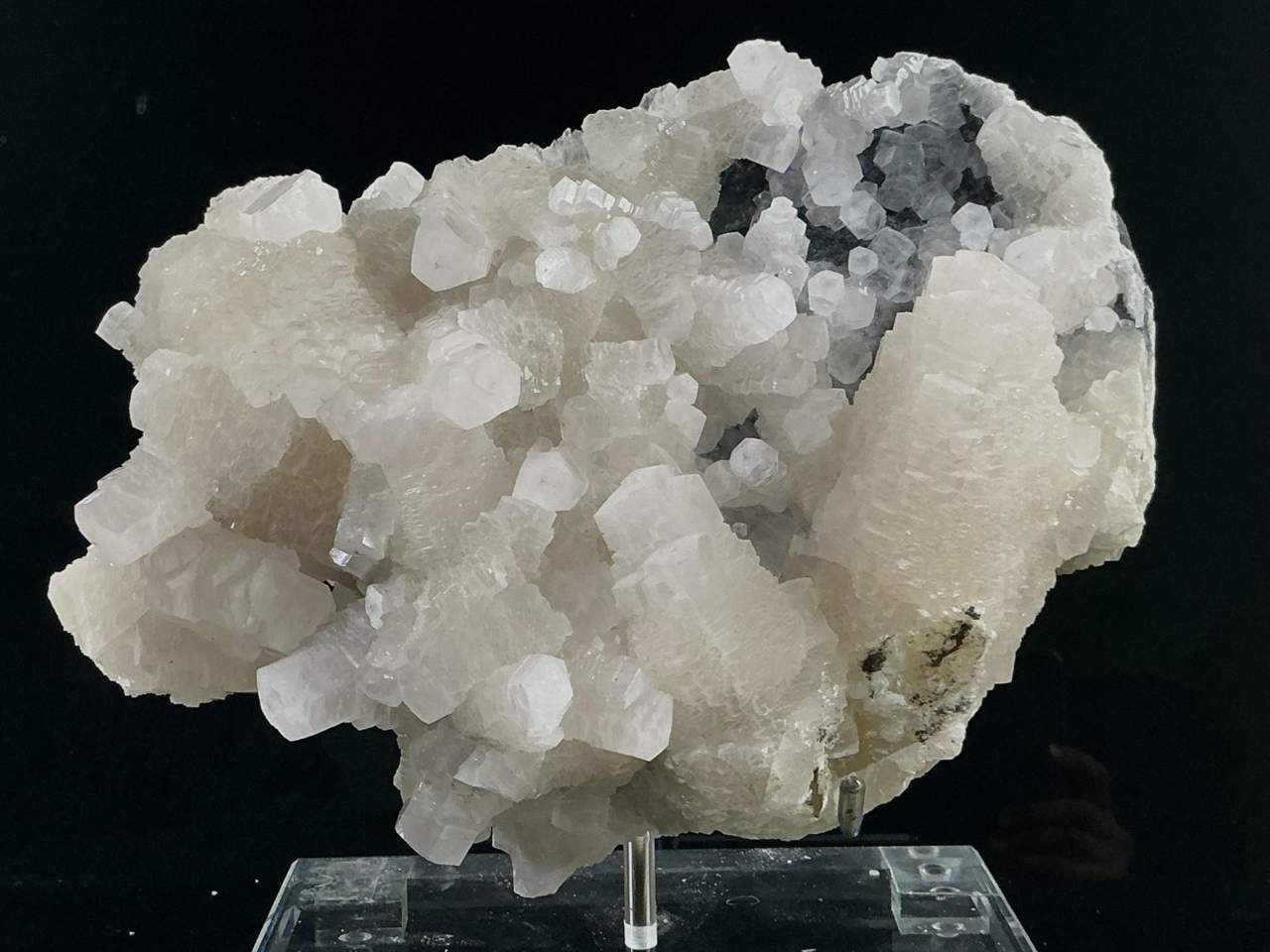 White stepped Calcite crystal cluster in neutral light