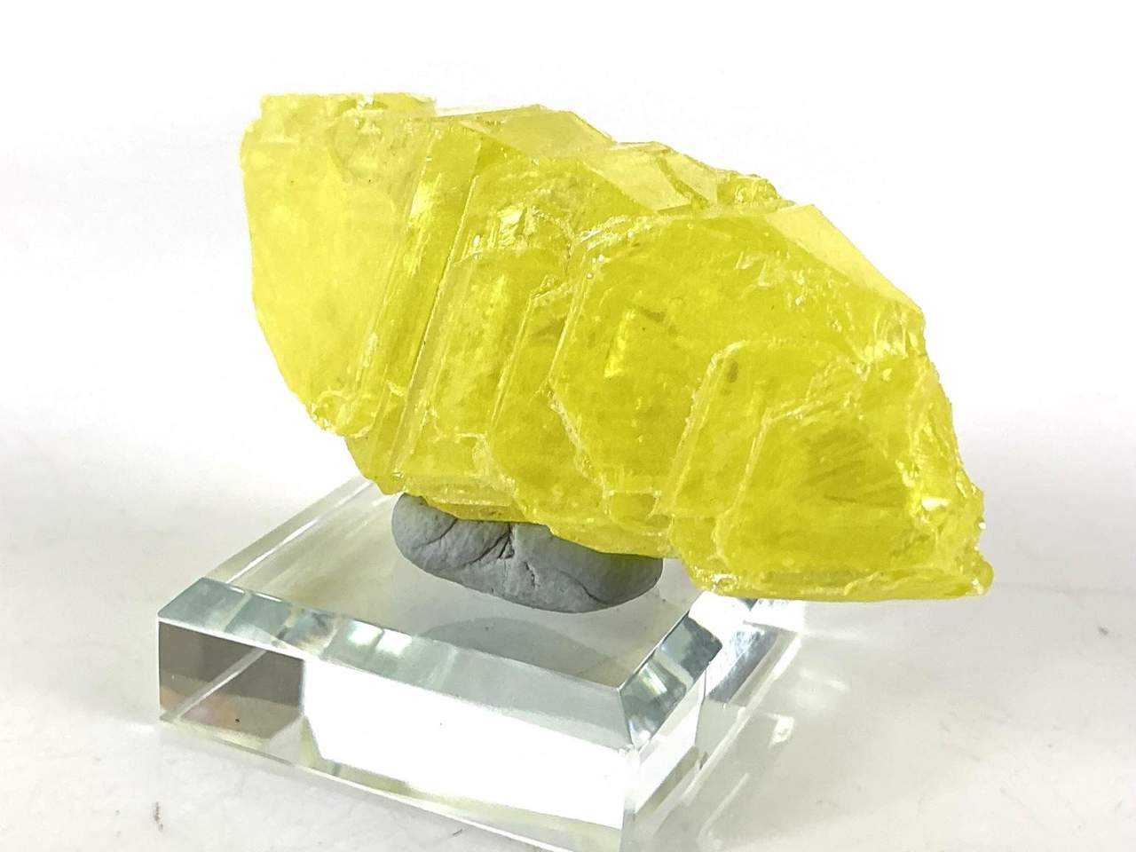 Natural yellow Sulphur crystal specimen from China in a clear thumbnail display box